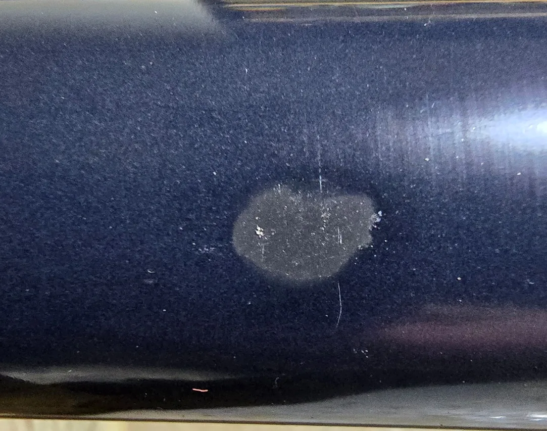 Prepared defect area on a carbon-fiber smoothing bar before restoration material was shaped